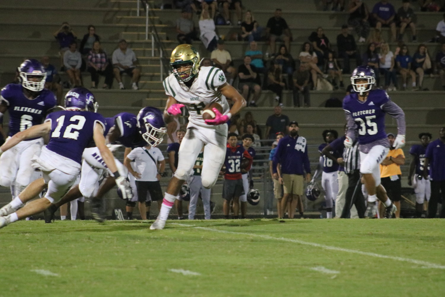 Donavan Wilson looks for yards after a reception against Fletcher Oct. 15. He and the Nease offense will look to rediscover their groove during the bye week.